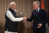 Indian Prime Minister Narendra Modi, left, and Canadian Prime Minister Mark Carney shake hands during a meeting at the G7 Summit in Kananaskis, Alta., on Tuesday, June 17, 2025. THE CANADIAN PRESS/Darryl Dyck