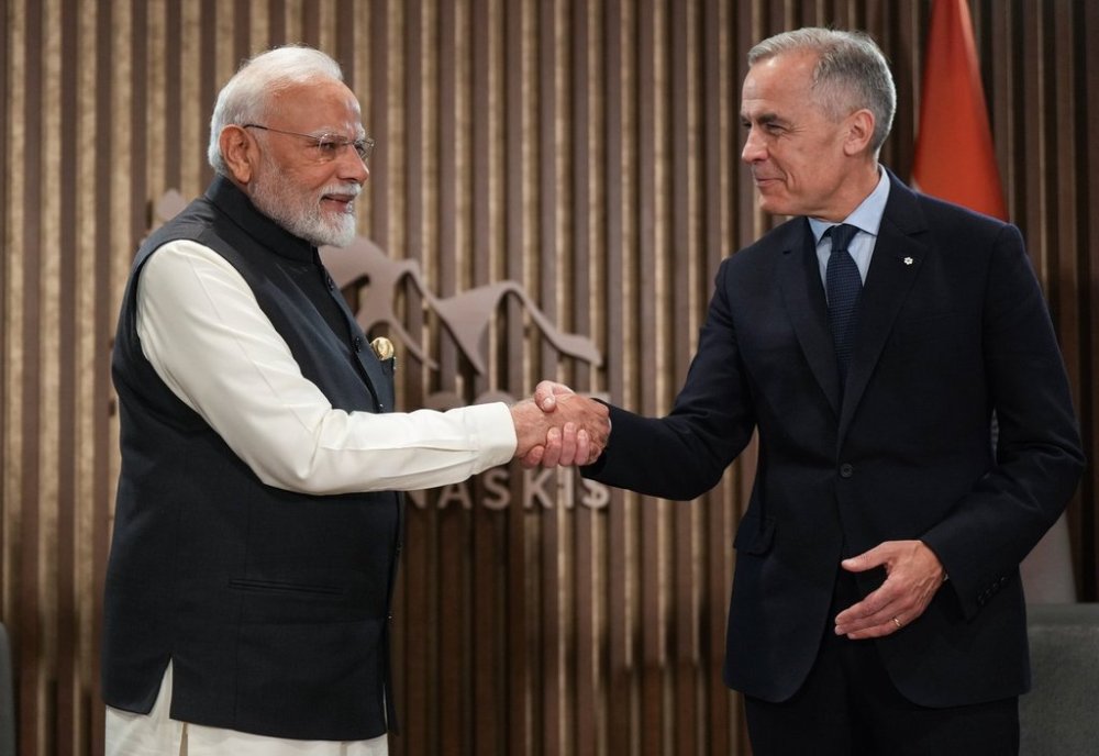 Indian Prime Minister Narendra Modi, left, and Canadian Prime Minister Mark Carney shake hands during a meeting at the G7 Summit in Kananaskis, Alta., on Tuesday, June 17, 2025. THE CANADIAN PRESS/Darryl Dyck