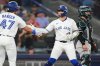 Blue Jays shortstop Bo Bichette (right) celebrates a leadoff home run with teammate Addison Barger during a Major League Baseball game against the Arizona Diamondbacks in Toronto on Wednesday, June 18, 2025. THE CANADIAN PRESS/Frank Gunn