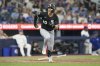 Chicago White Sox third base Miguel Vargas (20) reacts after hitting a two run RBI double off Toronto Blue Jays pitcher Jeff Hoffman during eighth inning MLB baseball action in Toronto on Sunday June 22, 2025. THE CANADIAN PRESS/Chris Young