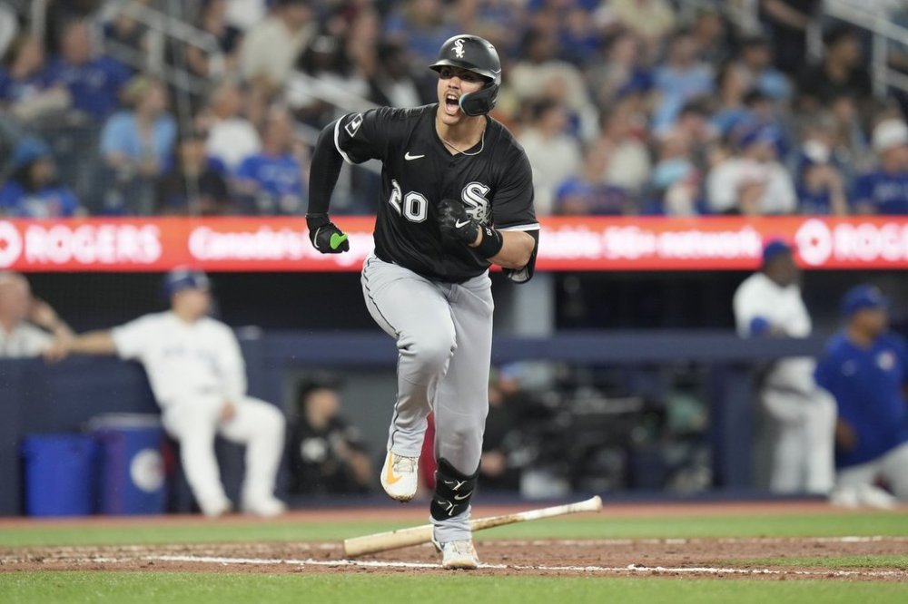 Chicago White Sox third base Miguel Vargas (20) reacts after hitting a two run RBI double off Toronto Blue Jays pitcher Jeff Hoffman during eighth inning MLB baseball action in Toronto on Sunday June 22, 2025. THE CANADIAN PRESS/Chris Young