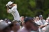 Joaquin Niemann watches his tee shot on the ninth hole during the second round of the PGA Championship golf tournament at the Quail Hollow Club, Friday, May 16, 2025, in Charlotte, N.C. (AP Photo/David J. Phillip)
