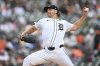 Detroit Tigers starting pitcher Dietrich Enns throws in the first inning of a baseball game against the Athletics, Thursday, June 26, 2025, in Detroit. (AP Photo/Lon Horwedel)