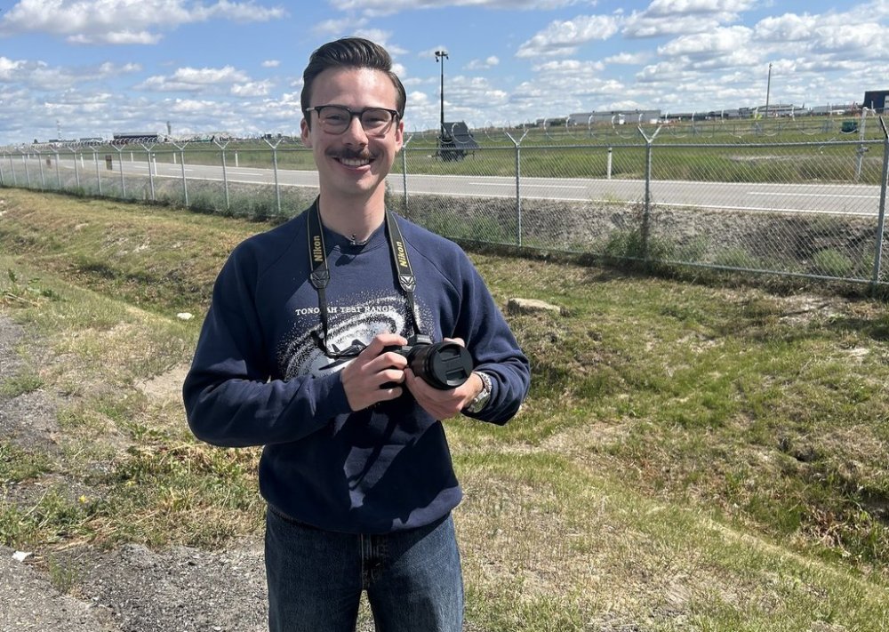 Plane spotter Corbin Johnson is shown at the Calgary International Airport on Saturday, June 14, 2025. With world leaders arriving in Calgary for the G7 leaders' summit in Kananaskis, Alta., airplane enthusiasts are setting up shop at the Calgary airport in hopes of seeing some exciting aircraft. THE CANADIAN PRESS/Bill Graveland