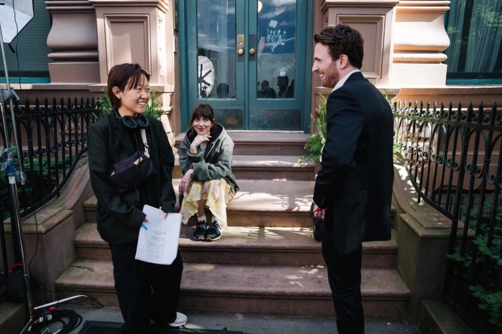 Korean-Canadian filmmaker Celine Song, left, is shown on the set of her New York-based romantic comedy “The Materialists” in this handout photo. THE CANADIAN PRESS/HO-A24 *MANDATORY CREDIT *