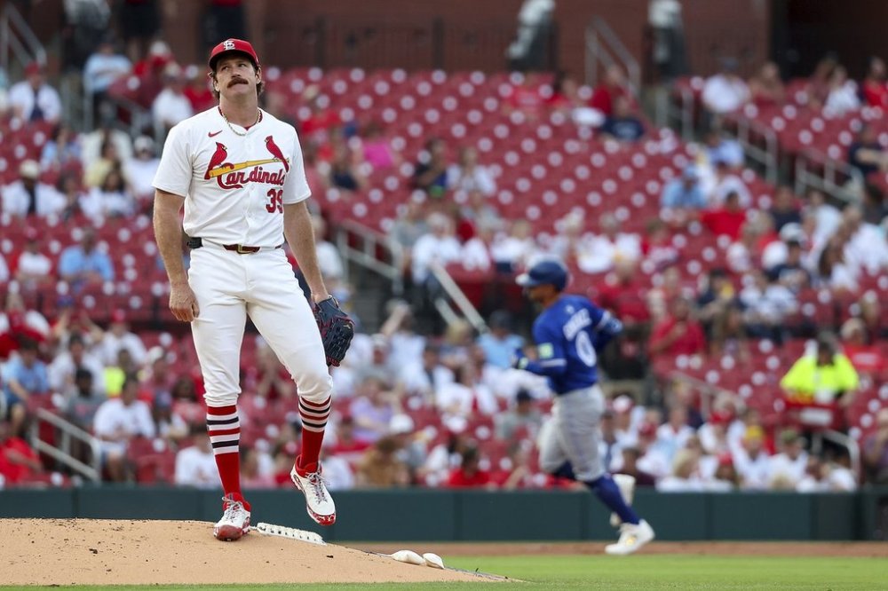 St. Louis Cardinals starting pitcher Miles Mikolas pauses on the mound after giving up a three-run home run to Toronto Blue Jays' Andrés Giménez during the first inning of a baseball game Tuesday, June 10, 2025, in St. Louis. (AP Photo/Scott Kane)