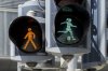 A pedestrian light features a woman kicking a soccer ball in Basel, Switzerland, to honor the Women's European Championship being hosted by the country, Friday, July 4, 2025. (Georgios Kefalas/Keystone via AP)/Keystone via AP)