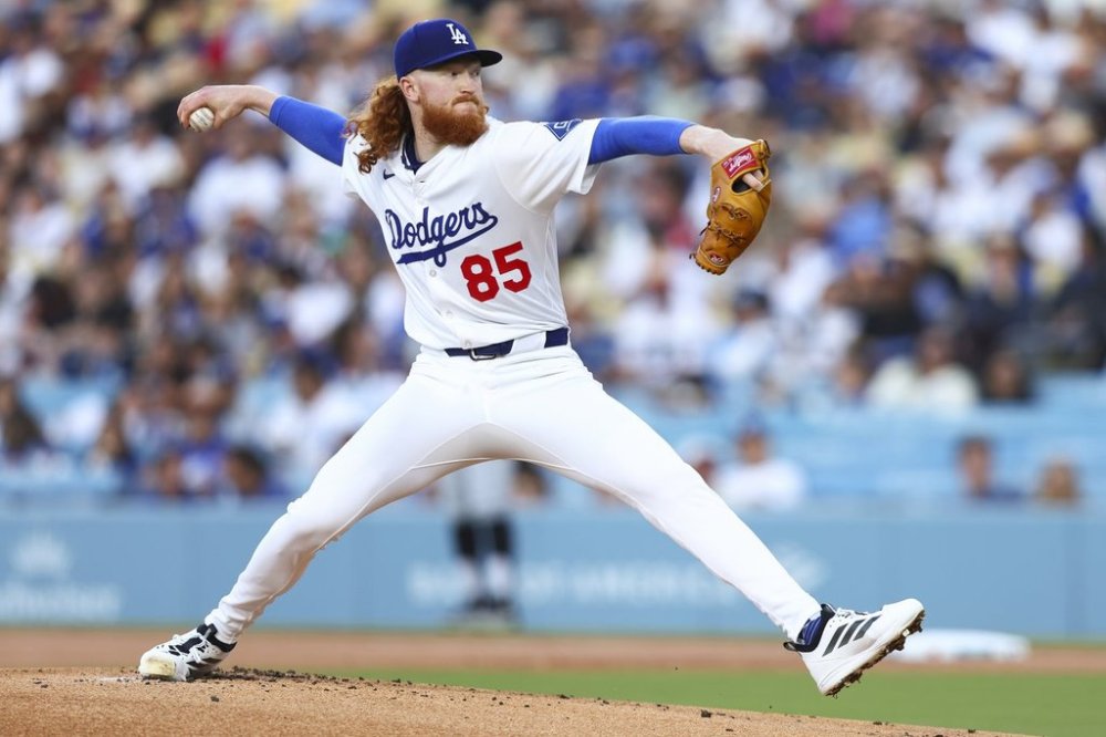 Los Angeles Dodgers pitcher Dustin May throws to a Chicago White Sox batter during the first inning of a baseball game, Thursday, July 3, 2025, in Los Angeles. (AP Photo/Jessie Alcheh)