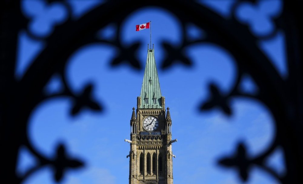 The Canada flag flies atop the Peace Tower on Parliament Hill in Ottawa on Friday, May 5, 2023. THE CANADIAN PRESS/Sean Kilpatrick