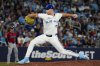 Toronto Blue Jays pitcher Mason Fluharty (68) throws a pitch during 8th inning MLB baseball action in Toronto on Tuesday, June 17, 2025. THE CANADIAN PRESS/Arlyn McAdorey
