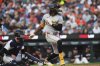 Pittsburgh Pirates' Oneil Cruz hits a single against the Detroit Tigers in the fifth inning during a baseball game, Tuesday, June 17, 2025, in Detroit. (AP Photo/Paul Sancya)