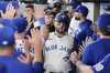 Toronto Blue Jays shortstop Bo Bichette (11) celebrates in the dug out after hitting a lead off home run off Chicago White Sox pitcher Aaron Civale during first inning MLB baseball action in Toronto on Saturday June 21, 2025. THE CANADIAN PRESS/Chris Young