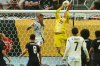 United States goalkeeper Matthew Freese (25) grabs a corner kick after Costa Rica defender Francisco Calvo (15) missed heading it in the second half of a CONCACAF Gold Cup quarterfinals soccer match Sunday, June 29, 2025, in Minneapolis. (Jeff Wheeler/Star Tribune via AP)