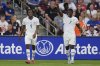 Switzerland forward Breel Embolo (7) celebrates his goal with midfielder Johan Manzanbi (9) during the first half of an international friendly soccer match against the United States, Tuesday, June 10, 2025, in Nashville, Tenn. (AP Photo/George Walker IV)