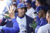 Toronto Blue Jays' George Springer (4) celebrates in the dug out after hitting a two run home run off Los Angeles Angels pitcher Jack Kochanowicz (41) during third inning MLB baseball action in Toronto, Saturday, July 5, 2025. THE CANADIAN PRESS/Chris Young