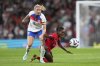 FILE - England's Leah Williamson, left, vies for the ball with Portugal's Diana Silva during the women's Nations League soccer match between England and Portugal at the Wembley Stadium, in London, Friday, May 30, 2025. (AP Photo/Kirsty Wigglesworth, File)