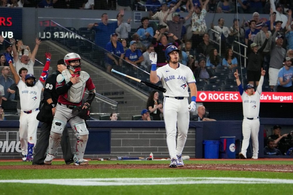 Blue Jays right-fielder Addison Barger (47) reacts after hitting a walkoff homer in Toronto's 5-4 win over the Arizona Diamondbacks at Rogers Centre on Tuesday, June 17, 2025. THE CANADIAN PRESS/Arlyn McAdorey