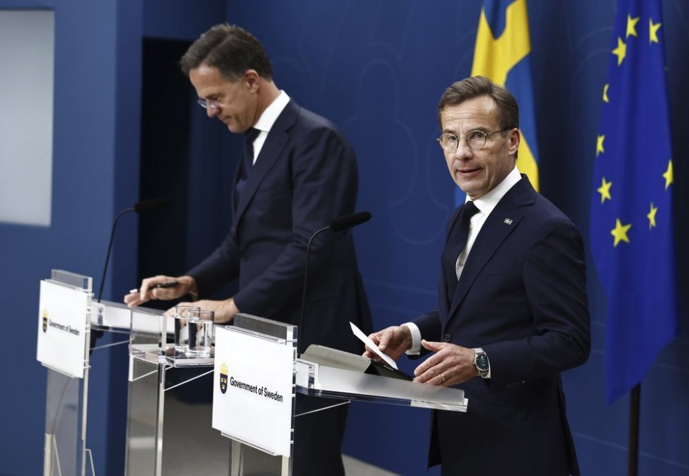 Swedish Prime Minister Ulf Kristersson, right, and NATO Secretary General Mark Rutte hold a joint press conference in Stockholm, Sweden, Friday June 13, 2025. (Stefan Jerrevång/TT News Agency via AP)