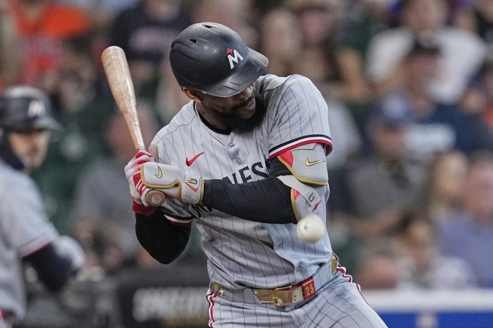 Minnesota Twins' Byron Buxton is hit by a pitch thrown by Houston Astros starting pitcher Hunter Brown during the sixth inning of a baseball game Saturday, June 14, 2025, in Houston. (AP Photo/David J. Phillip)