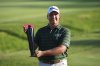 Aldrich Potgieter, of South Africa poses with the trophy after winning a playoff during the final round of the Rocket Classic golf tournament at the Detroit Golf Club, Sunday, June 29, 2025, in Detroit. (AP Photo/Paul Sancya)