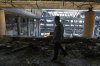 A man walks through the damaged headquarters of Islamic Republic of Iran Broadcasting, Iranian state television, in Tehran, Iran on Thursday, June 19, 2025. (AP Photo/Vahid Salemi)