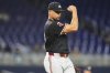 Minnesota Twins relief pitcher Jhoan Duran reacts after getting the final out during the ninth inning of a baseball game against the Miami Marlins, Wednesday, July 2, 2025, in Miami. (AP Photo/Lynne Sladky)