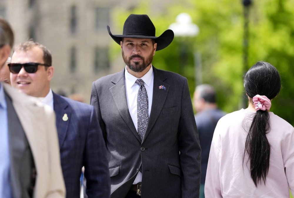 Conservative MP Damien Kurek, who announced he would give up his seat so party leader Pierre Poilievre can run in a byelection, arrives for meeting of the Conservative caucus on Parliament Hill in Ottawa, on Sunday, May 25, 2025. THE CANADIAN PRESS/Justin Tang