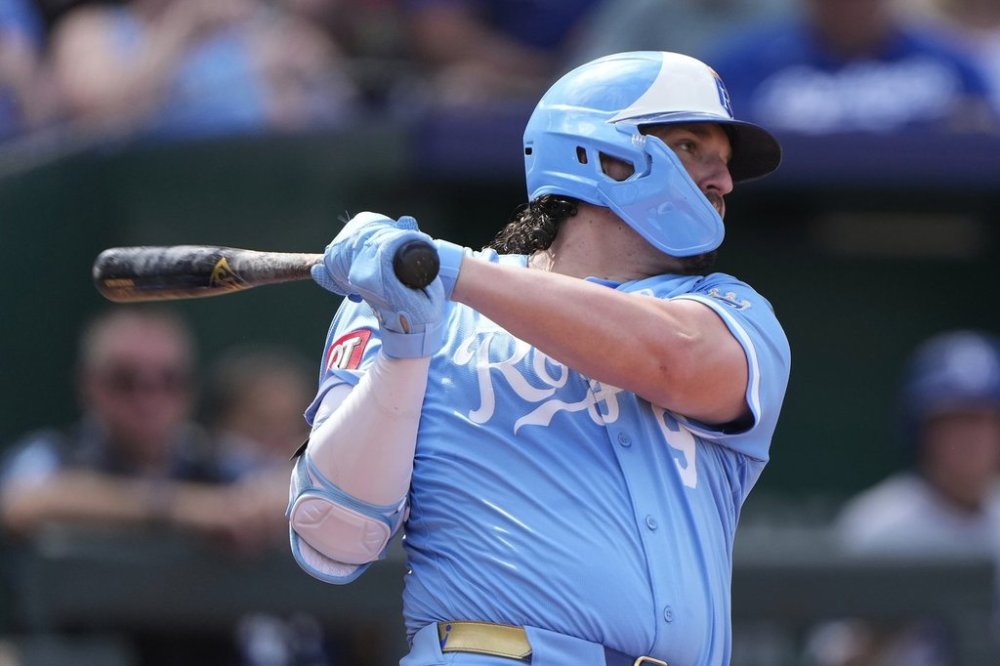 Kansas City Royals' Vinnie Pasquantino watches his three-run home run during the fifth inning of a baseball game against the Los Angeles Dodgers, Saturday, June 28, 2025, in Kansas City, Mo. (AP Photo/Charlie Riedel)
