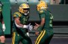 Edmonton Elks' Justin Rankin (5) and quarterback Tre Ford (2) celebrate a touchdown against the Ottawa Redblacks during first half CFL action in Edmonton, on Sunday July 6, 2025. THE CANADIAN PRESS/Jason Franson