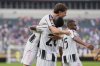 Juventus' Randal Kolo Muani lifts Kenan Yildiz after he scored second goal during the Club World Cup Group G soccer match between Juventus and Wydad AC in Philadelphia, Sunday, June 22, 2025. (AP Photo/Chris Szagola)