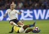 FILE -France's Eugenie Le Sommer, left, is tackled by Brazil's Formiga during the Women's World Cup round of 16 soccer match between France and Brazil at the Oceane stadium in Le Havre, France, June 23, 2019. (AP Photo/Francisco Seco), File)