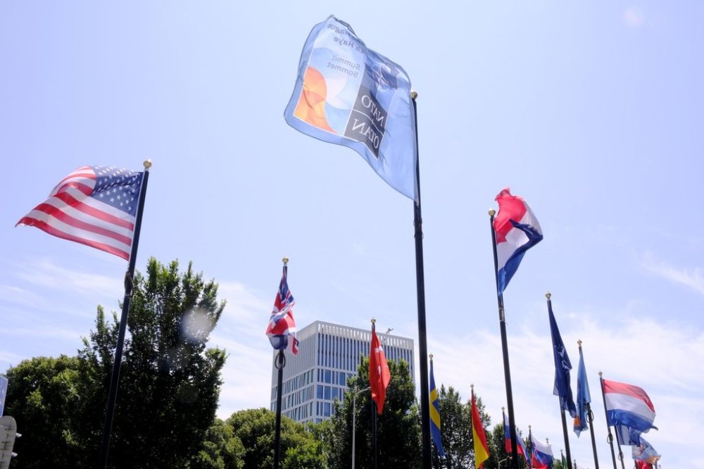 International flags on the venue ahead of the upcoming NATO summit in The Hague, Netherlands, Monday, June 23, 2025. (AP Photo/Patrick Post)