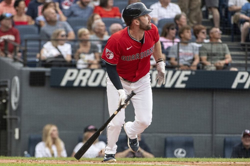 Cleveland Guardians' David Fry watches his two-run home run off Colorado Rockies starting pitcher Kyle Freeland during the first inning of a baseball game, Wednesday, July 30, 2025, in Cleveland. (AP Photo/Phil Long)