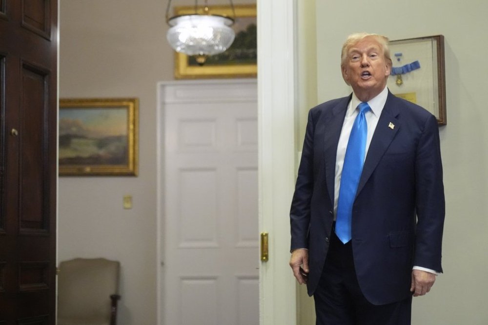 U.S. President Donald Trump leaves after an event to sign the VA Home Loan Program Reform Act into law in the Roosevelt Room at the White House on Wednesday, July 30, 2025, in Washington. (AP Photo/Mark Schiefelbein)