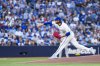 Toronto Blue Jays pitcher Kevin Gausman (34) throws a pitch against the New York Yankees during first inning MLB baseball action, in Toronto on Monday, July 21, 2025. THE CANADIAN PRESS/Thomas Skrlj