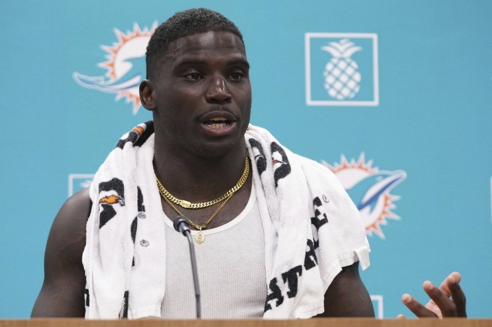 Miami Dolphins wide receiver Tyreek Hill speaks during a news conference at the NFL football team's training camp, Tuesday, July 22, 2025, in Miami Gardens, Fla. (AP Photo/Lynne Sladky)