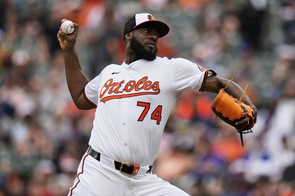 Baltimore Orioles relief pitcher Felix Bautista (74) delivers during the ninth inning in the first baseball game of a doubleheader against the New York Mets, Thursday, July 10, 2025, in Baltimore. (AP Photo/Stephanie Scarbrough)