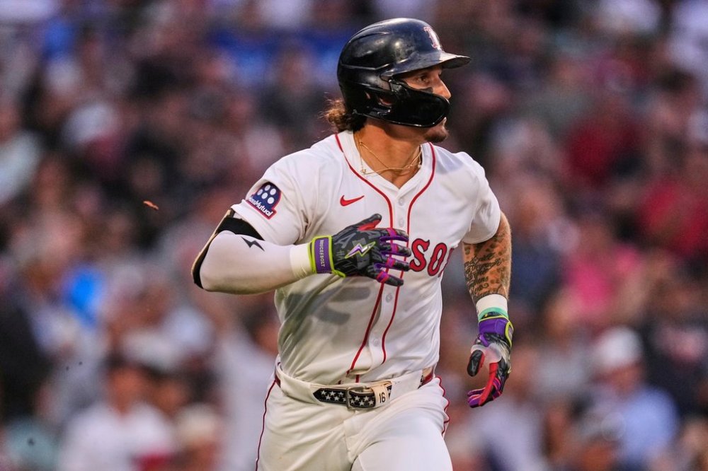 Boston Red Sox's Jarren Duran watches the flight of his three-run home run in the first inning of a baseball game against the Kansas City Royals at Fenway Park, Monday, Aug. 4, 2025, in Boston. (AP Photo/Charles Krupa)