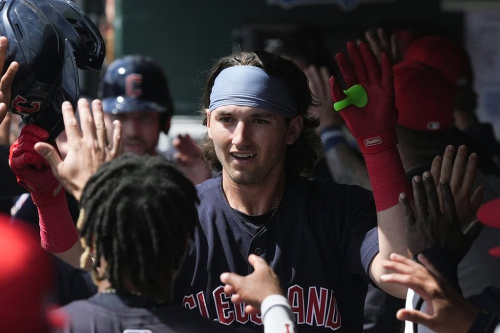 FILE - Cleveland Guardians' Chase DeLauter celebrates his three-run home run against the Chicago White Sox during the first inning of a spring training baseball game, March 18, 2024, in Phoenix. (AP Photo/Ross D. Franklin, File)