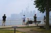 People take in a city view of Toronto on Monday July 14, 2025. The Air Quality Health Index rating for Toronto was over 10, or 