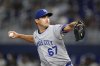 Kansas City Royals starting pitcher Seth Lugo pitches during the second inning of a baseball game against the Miami Marlins, Friday, July 18, 2025, in Miami. (AP Photo/Rebecca Blackwell)