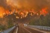 A wildfire rages across a forested area near Cavuslar village, in Karabuk district, northwest Turkey, Wednesday, July 23, 2025. (Ridvan Bostanci/IHA via AP)