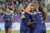 France's Amel Majri, center, celebrates with teammates after scoring her sides third goal during the Euro 2025, group D, soccer match between France and Wales at Arena St. Gallen in St. Gallen, Switzerland, Wednesday, July 9, 2025. (AP Photo/Martin Meissner)