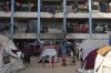 FILE - Displaced Palestinians live in a school run by UNRWA, the U.N. agency, in Gaza City, Monday, June 23, 2025. (AP Photo/Jehad Alshrafi, File)