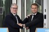 British Prime Minister Keir Starmer, left, and French President Emmanuel Macron hold a joint press conference in London, Thursday July 10, 2025. (Leon Neal/Pool Photo via AP)