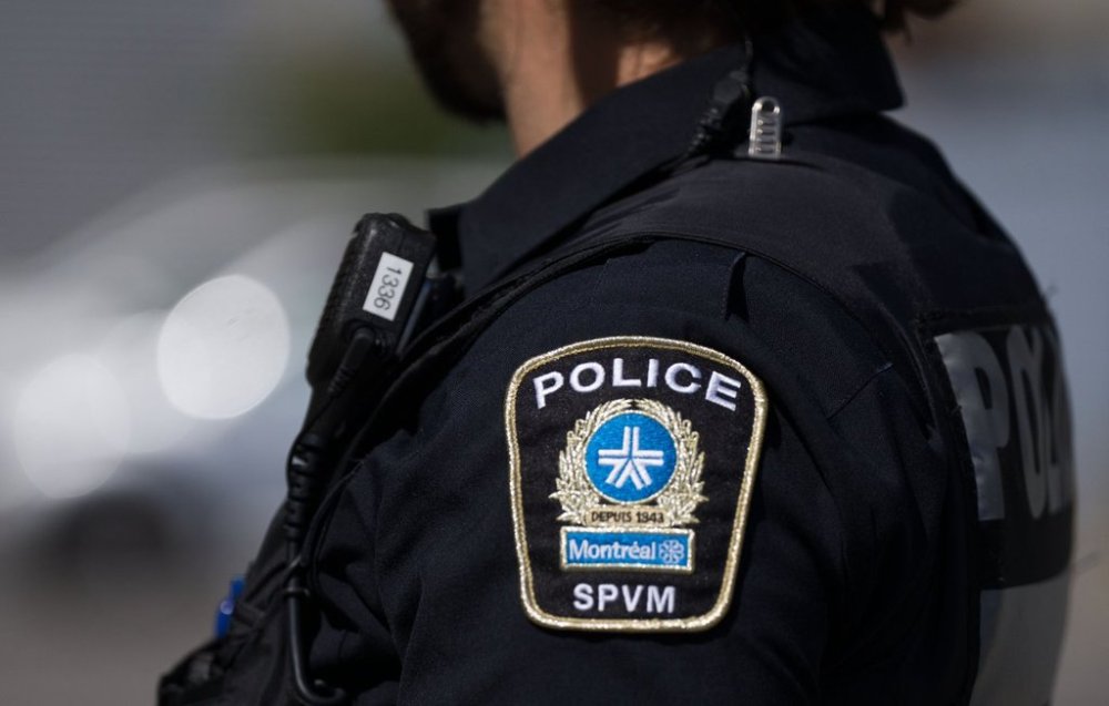 A Montreal police shoulder patch is seen on an officer in Montreal, Thursday, Aug. 29, 2024. THE CANADIAN PRESS/Christinne Muschi
