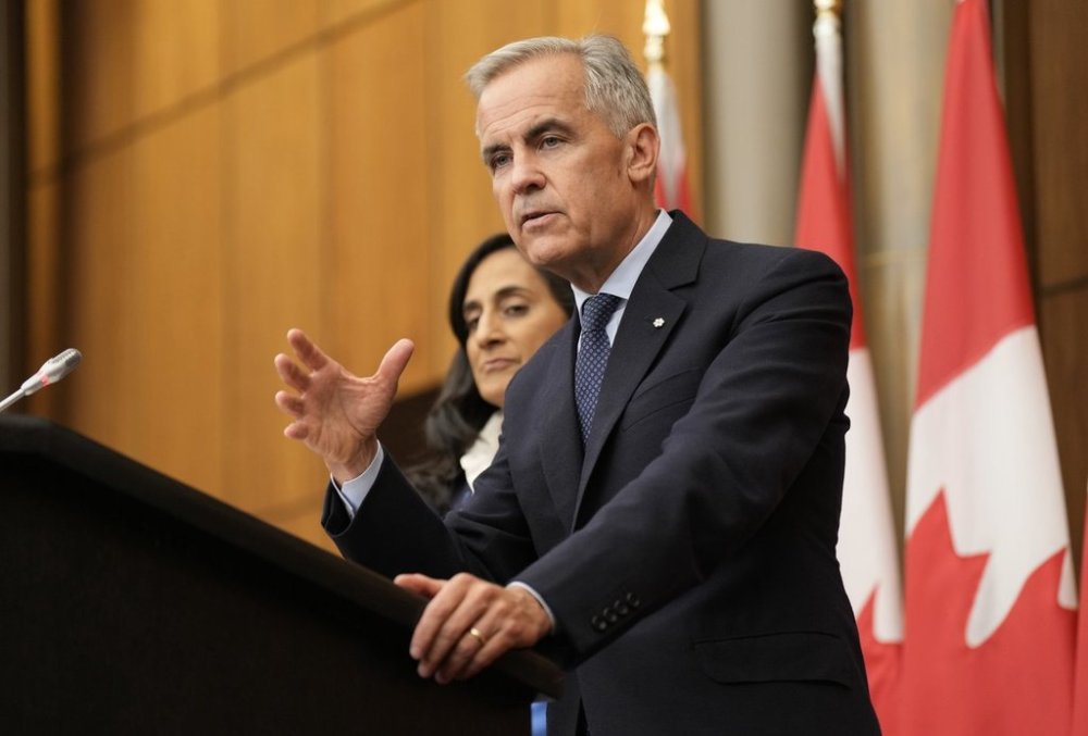 Prime Minister Mark Carney speaks with media during a news conference in Ottawa, Wednesday, July 30, 2025. THE CANADIAN PRESS/Adrian Wyld