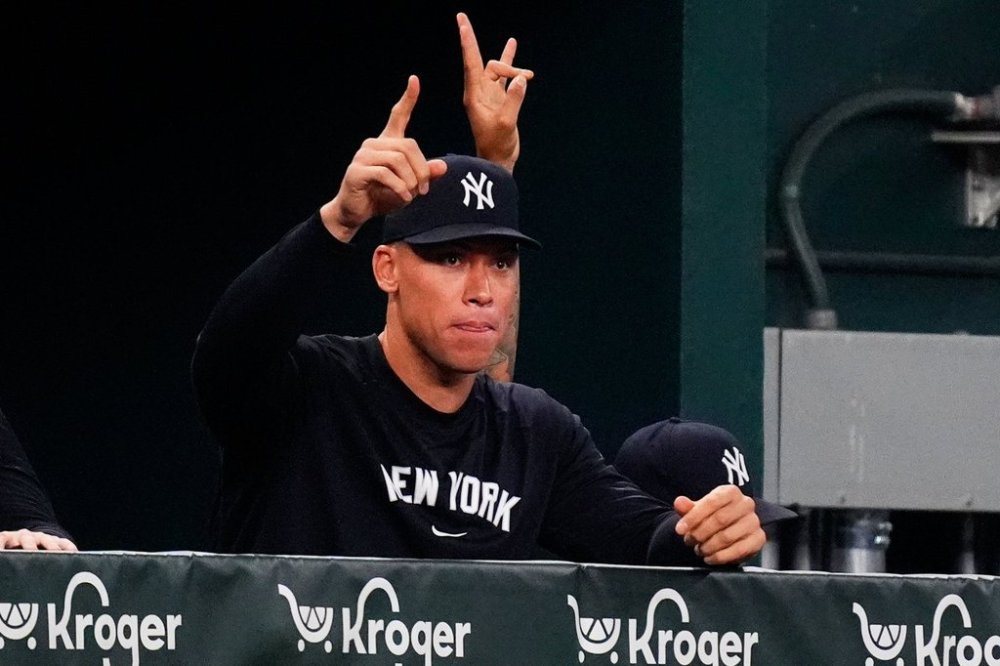 New York Yankees Aaron Judge gestures in the dugout during the second inning of a baseball game against the Texas Rangers, Monday, Aug. 4, 2025, in Arlington, Texas. (AP Photo/LM Otero)