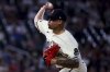 Minnesota Twins pitcher Jhoan Duran delivers to the Washington Nationals during the ninth inning of a baseball game Friday, July 25, 2025, in Minneapolis. (AP Photo/Ellen Schmidt)