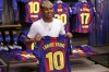 FC Barcelona player Lamine Yamal poses with his new jersey after signing a contract extension with the soccer club in Barcelona, northern Spain, Wednesday, July 16, 2025. (AP Photo/Joan Monfort)